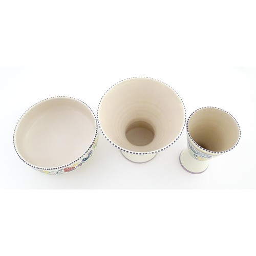 47 - Three items of Poole Pottery to include a bowl, and two vases of flared, waisted form. Tallest appro... 