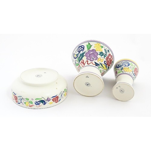 47 - Three items of Poole Pottery to include a bowl, and two vases of flared, waisted form. Tallest appro... 
