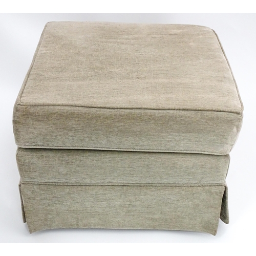 28 - A beige upholstered Pouffe / footstool. The top removing to reveal storage space within. Approx 21 1... 