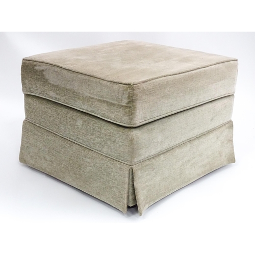 28 - A beige upholstered Pouffe / footstool. The top removing to reveal storage space within. Approx 21 1... 