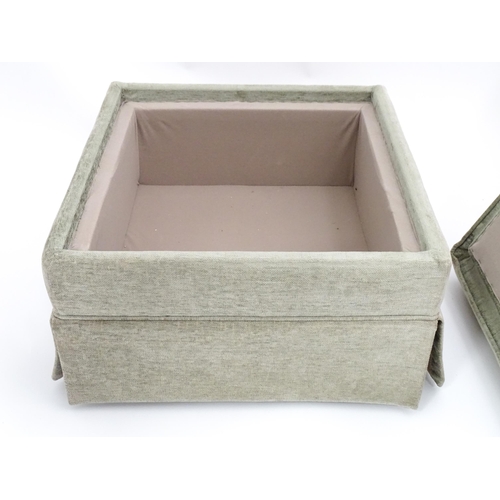 28 - A beige upholstered Pouffe / footstool. The top removing to reveal storage space within. Approx 21 1... 