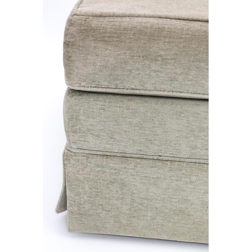 28 - A beige upholstered Pouffe / footstool. The top removing to reveal storage space within. Approx 21 1... 