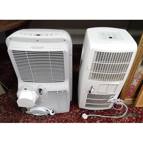 30 - A Pump House air conditioning unit with remote control and hose. Together with a Homebase air condit... 