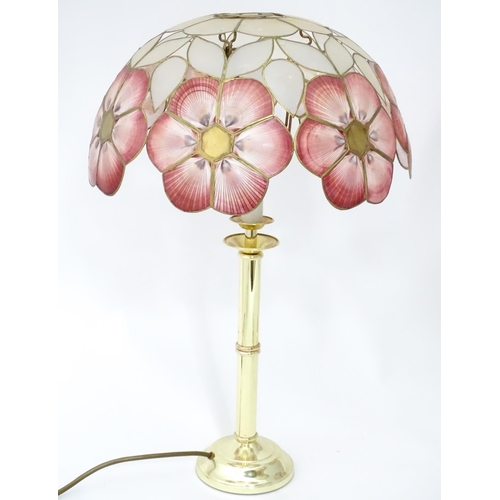 6 - A brass standard lamp with leaded glass shade, together with three table lamps . The table lamps app... 