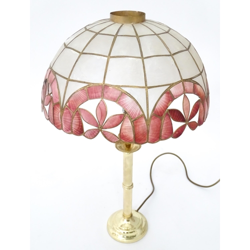 6 - A brass standard lamp with leaded glass shade, together with three table lamps . The table lamps app... 