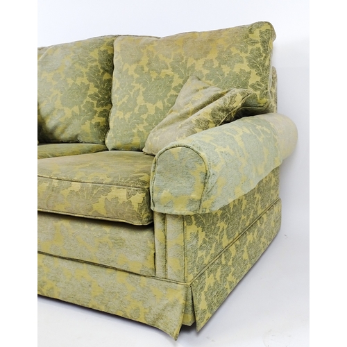 23 - A modern two seater sofa. 64