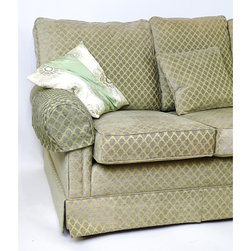 4 - A modern three seater sofa. 79
