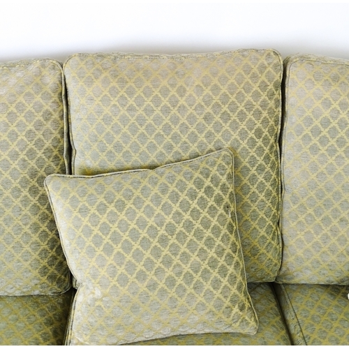 4 - A modern three seater sofa. 79