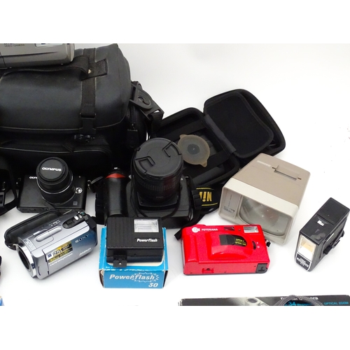 29 - A quantity of assorted cameras to include a Pentax Optio 330, a Hirix HD dual lens dash cam, an Olym... 
