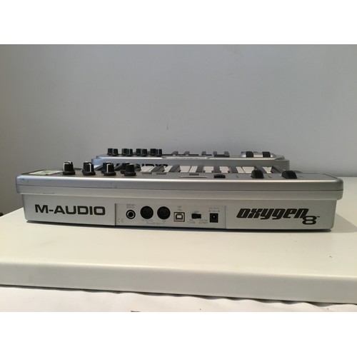 97 - A M-Audio Midiman Oxygen8 Midi Keyboard;  another (2)