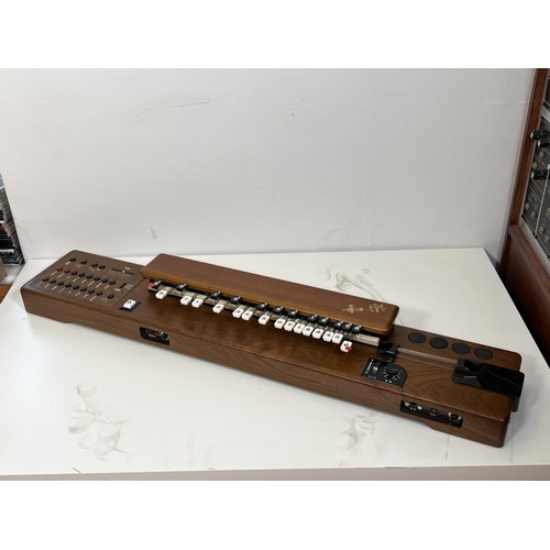 35 - Suzuki TES-100 Waraku Koto Synth, complete with hardcase/accessories.
These are great fun – lots of ... 