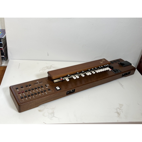 35 - Suzuki TES-100 Waraku Koto Synth, complete with hardcase/accessories.
These are great fun – lots of ... 