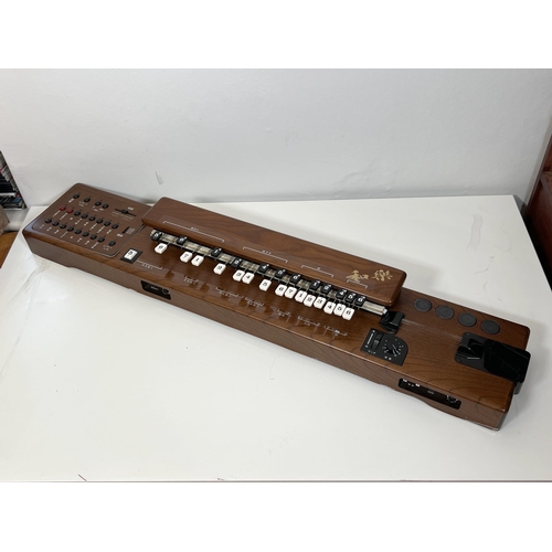 44 - Suzuki TES-100 Waraku Koto Synth, complete with hardcase/accessories.
These are great fun – lots of ... 