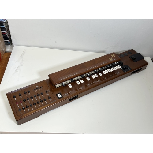 44 - Suzuki TES-100 Waraku Koto Synth, complete with hardcase/accessories.
These are great fun – lots of ... 