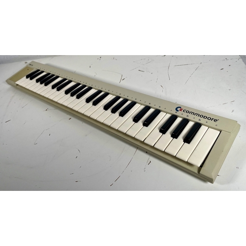 52 - Commodore MK-10 MIDI Keyboard

(E) Untested. We have no information about the functional status of t... 