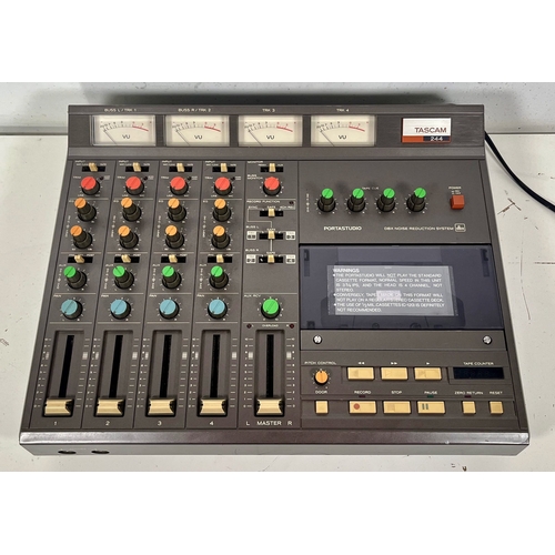 122 - Tascam 244 Portastudio.

(E) Untested. We have no information about the functional status of this it... 