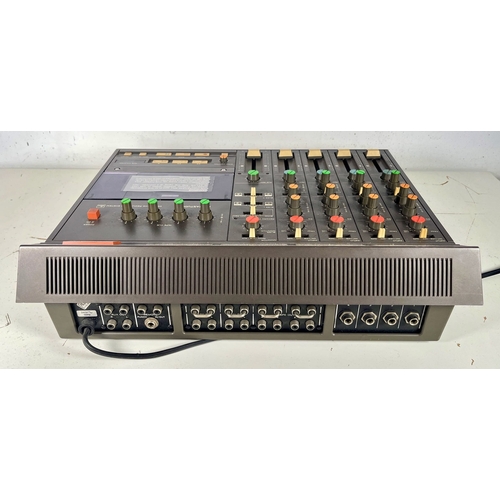 122 - Tascam 244 Portastudio.

(E) Untested. We have no information about the functional status of this it... 