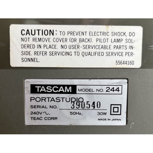 122 - Tascam 244 Portastudio.

(E) Untested. We have no information about the functional status of this it... 