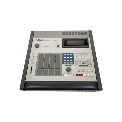 49 - Akai MPC-60, Zip Drive, Latest OS.

(B) Tested and working - powers up and appears to work as intend... 