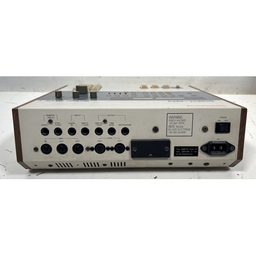 72 - Roland SBX-80 Sync Box

Device for synchronizing various music hardware with precise timing control.... 