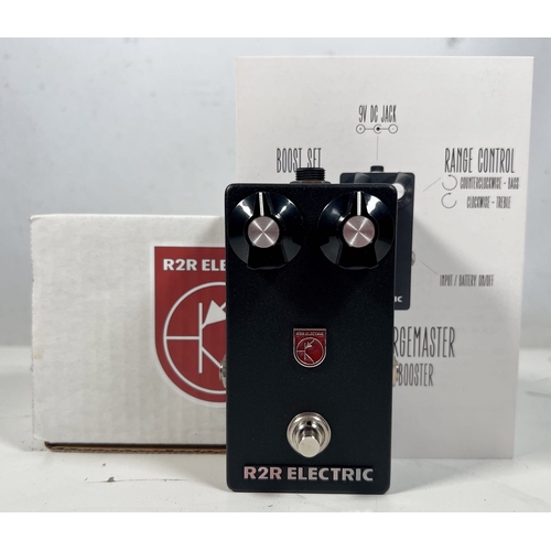 R2R Electric R2RGeMaster Germanium Treble Booster. Brand New, Boxed.

Serial #26. Treble booster made with a modified, yet faithful, version of the 1960s Dallas Rangemaster circuit. Brand new pedal, hand-built in 2021. As new with all packaging and paperwork.

(A) Tested and working. 
No guarantee or warranty implied. Operational status may change during shipping. See the main Buying Page for further important information.

For UK bidders only this item will be subject to 20% VAT on the hammer price and on the Buyer’s Premium (this amount is included in the Total Fees percentage attached to this item). For all bidders outside the UK there will be no VAT on the hammer price but VAT is charged on the Buyer’s Premium.