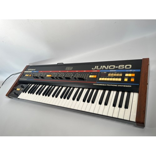 92 - Roland Juno-60 - 61 key Polyphonic Analogue Synthesizer

(C) Tested. Powers up, passes signal but ha... 