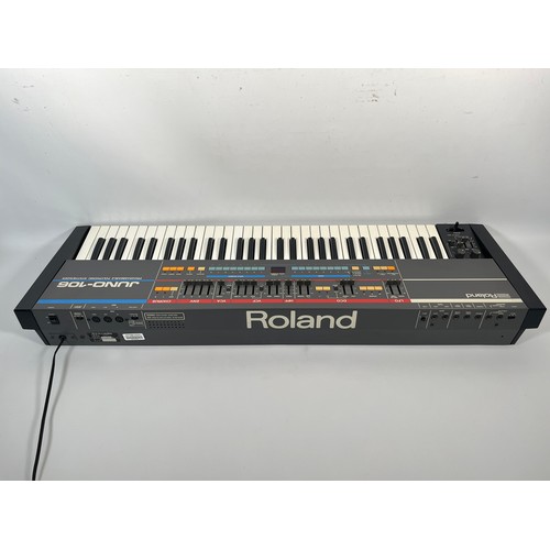 95 - Roland Juno-106 - 61 key Polyphonic Analogue Synthesizer with original voice chips

Tested and worki... 