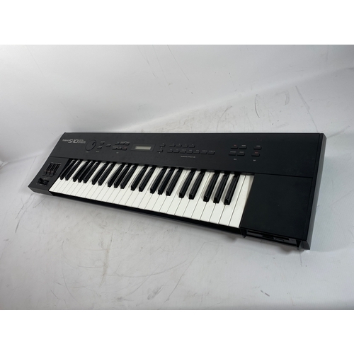 28 - Roland S-10 Digital Sampling Keyboard