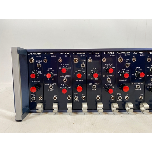 143 - Digitimer Neurolog system

Includes the following modules

A.C. Preamp x3
A.C. Amp x3
Filters x4
Neu... 