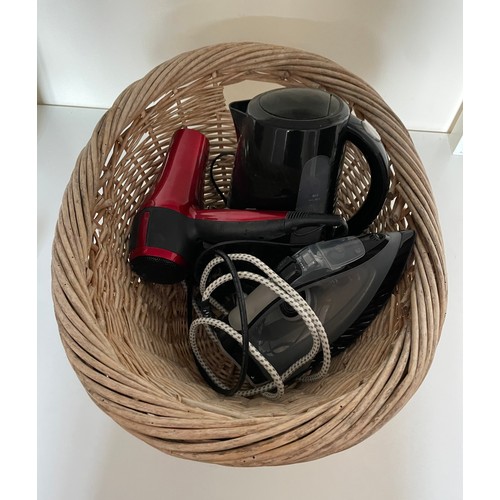 82 - mnda - Wicker basket with collection of electrical items - iron,kettle and hairdryer