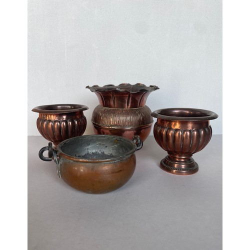 118 - Four copper containers including urns and vase