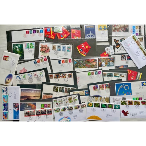 66 - Stamps - Album of 57 addressed and franked first day covers from 1990 - 1995 and books of stamps. Ma... 