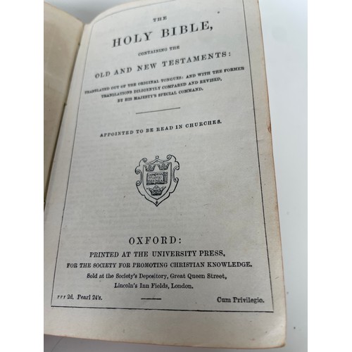 100 - Oxford University Press leather bound copy of The Holy Bible. Intact. Clasp missing. Pearl 24’s 13.5... 