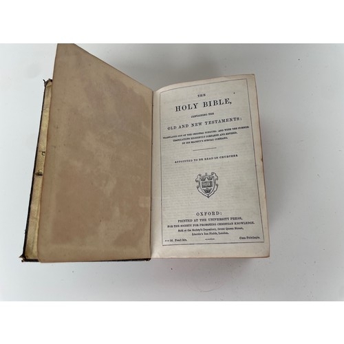 100 - Oxford University Press leather bound copy of The Holy Bible. Intact. Clasp missing. Pearl 24’s 13.5... 