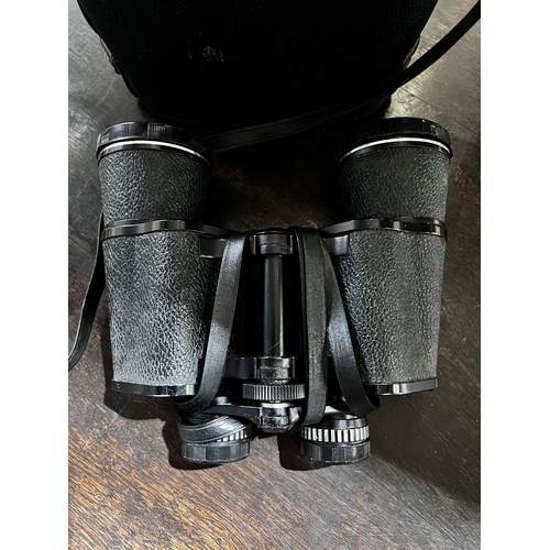 107 - Vintage Binoculars - Boots Pacer 12x50mm. With Case.