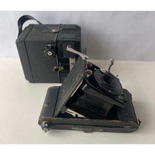 110 - Two vintage cameras
Box camera - Coronet Consul 1950’s 6 x9 cm 120 roll film 
Folding camera - Ensig... 