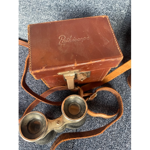 114 - A pair of opera glasses and two leather unassociated binocular cases - one Pathescope, one Ross of L... 