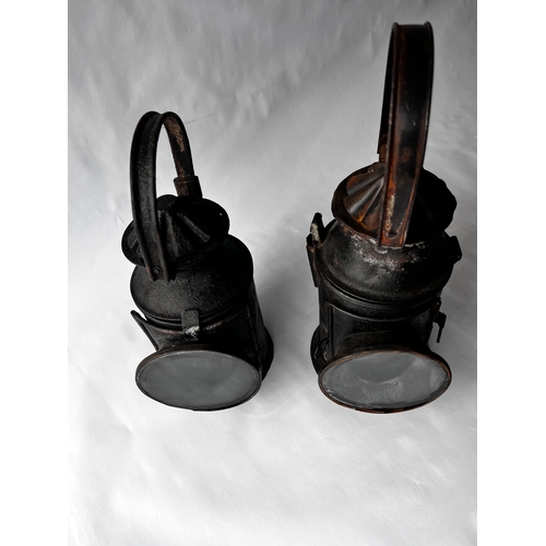 115 - Two vintage Indian Railway Signal Lamps complete with internal lenses and oil burners.