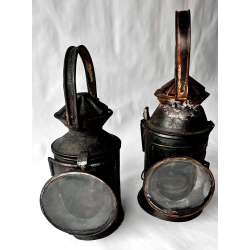 115 - Two vintage Indian Railway Signal Lamps complete with internal lenses and oil burners.
