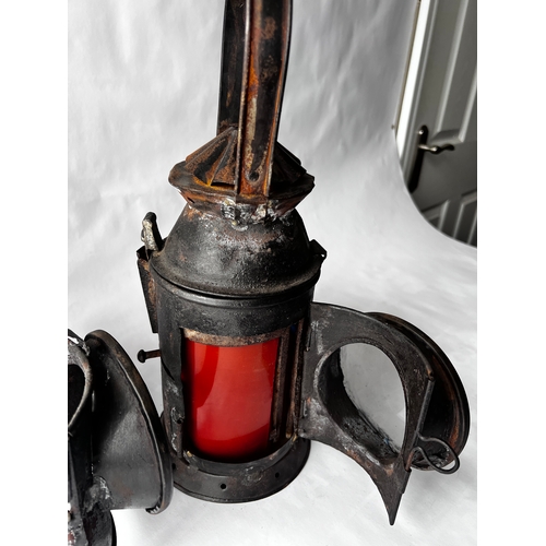 115 - Two vintage Indian Railway Signal Lamps complete with internal lenses and oil burners.