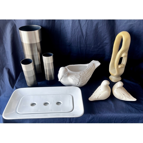 76 - Assorted homeware. Soapstone abstract sculpture. Metal vases, duck shaped planter, oblong serving di... 