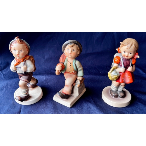 100 - Three Goebel M.I. Hummel Figurines
