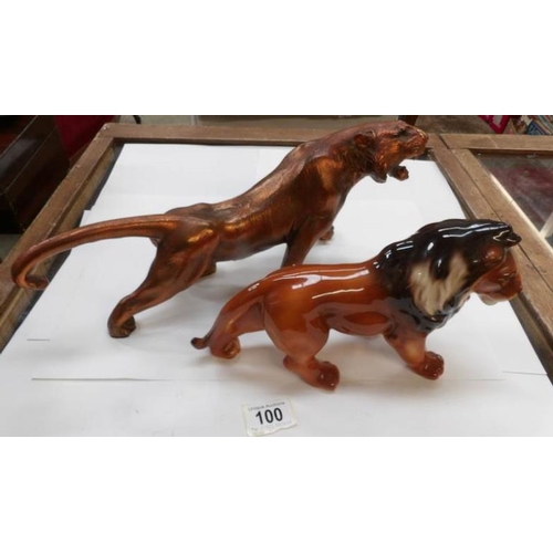 100 - A lion and a tiger figure