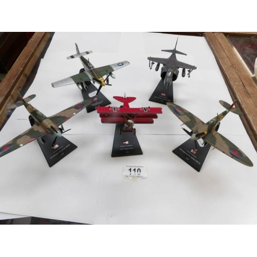 110 - 5 model aeroplanes on stands