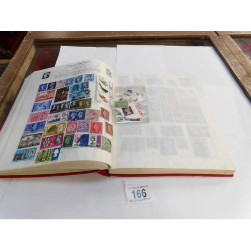 166 - 2 albums of world stamps