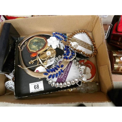 68 - A mixed lot of jewellery, photo frames etc