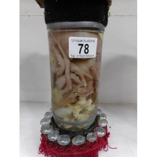 78 - A preserved octopus in a jar