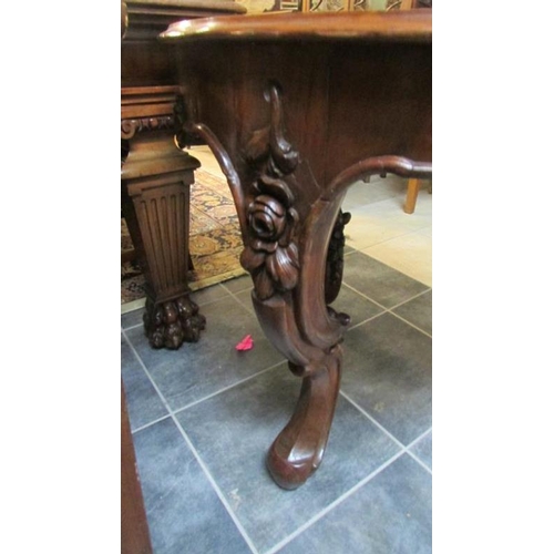 1778 - An Italian carved table with decorative marble top