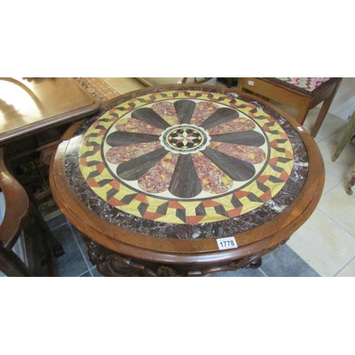 1778 - An Italian carved table with decorative marble top