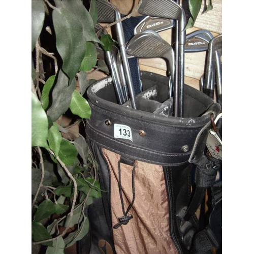 133 - A set of golf clubs